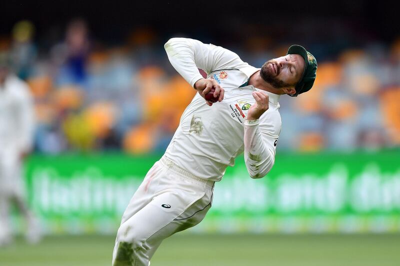 Australia's fielder Matthew Wade takes a successful catch to dismiss Pakistan's batsman Imran Khan. AFP