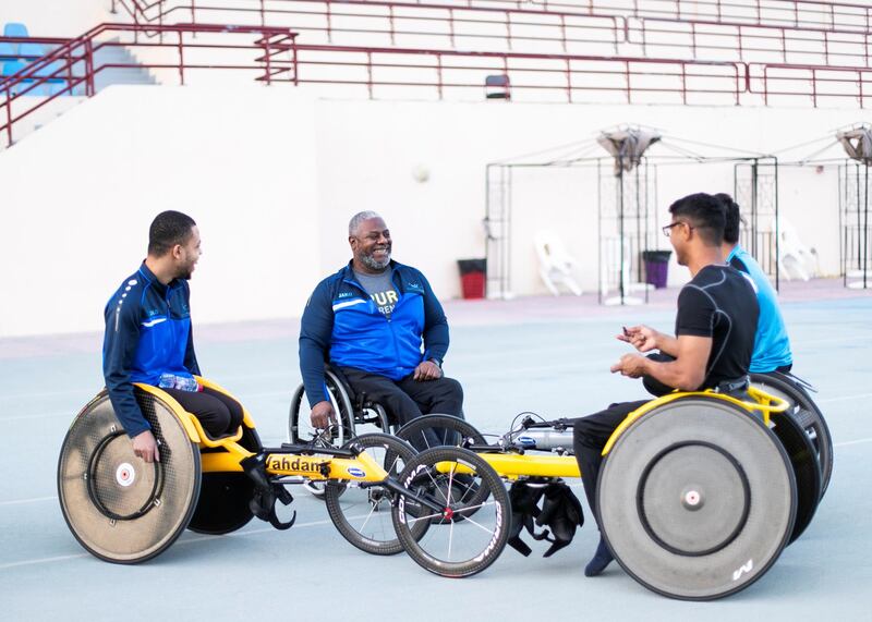 DUBAI, UNITED ARAB EMIRATES. 17 DECEMBER 2020. 
Emirati Paralympian powerlifter Mohammed Khamis Khalaf, second to left, training at Dubai Club for People of Determination.
(Photo: Reem Mohammed/The National)

Reporter:
Section: