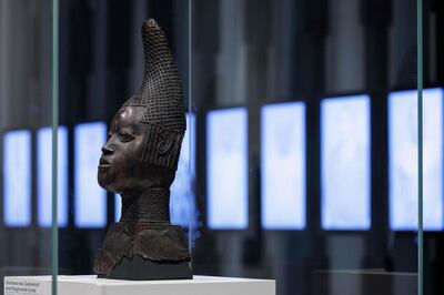 A sculpture with the title 'Uhunmwun Elao' on display with other Benin bronzes in Germany. AFP