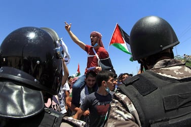 Jordanian protesters demonstrate in the town of Karameh, on the border with Israel, on May 14. AFP