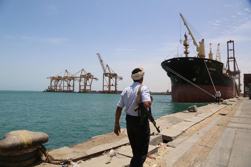 FILE PHOTO: A soldier walks at Red Sea port of Hodeidah, Yemen May 10, 2017. REUTERS/Abduljabbar Zeyad/File Photo