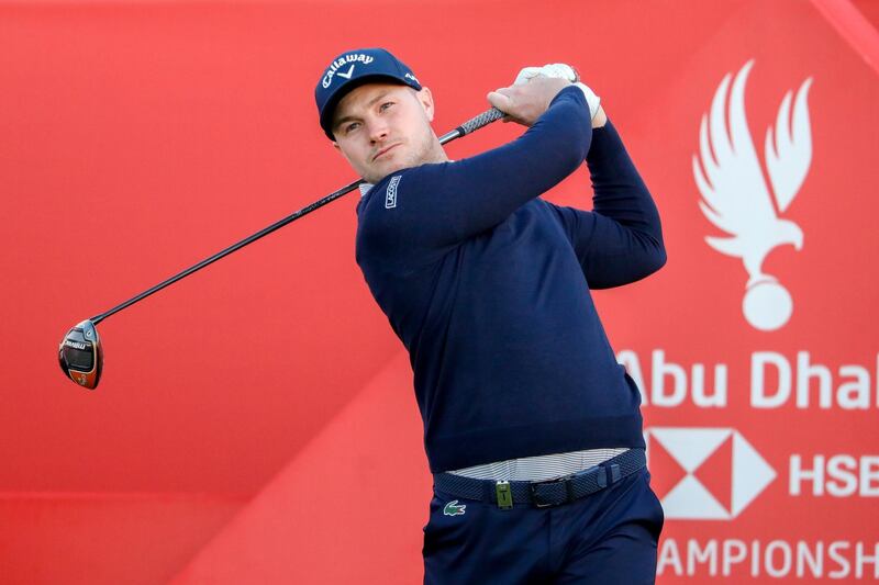 Abu Dhabi, United Arab Emirates, January 16, 2020.  2020 Abu Dhabi HSBC Championship.
--  Oliver Fisher tees off from the 1st tee.
Victor Besa / The National
Section:  SP
Reporter:  Paul Radley and John McAuley