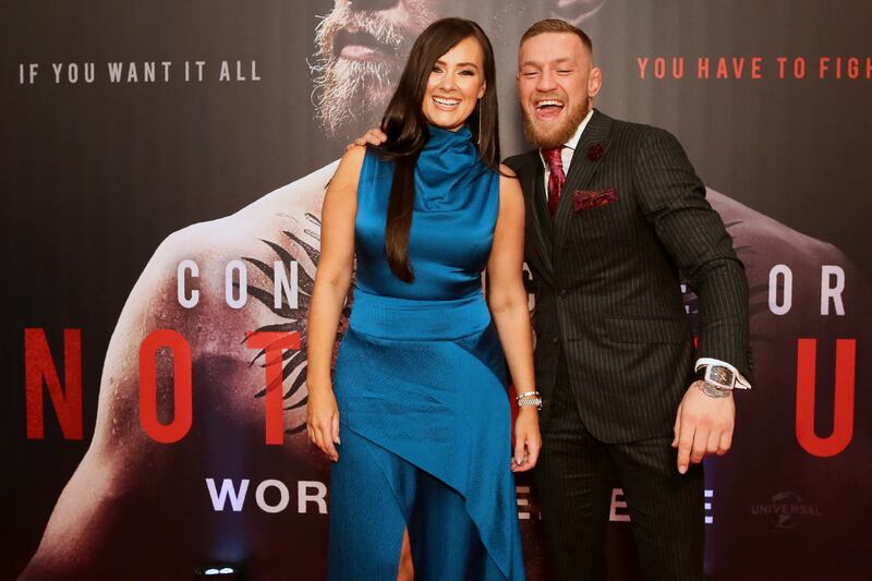 Conor McGregor poses with his partner Dee upon arrival to attend the world premiere of the documentary film 'Conor McGregor: Notorious' at the Savoy Cinema in Dublin, Ireland, on November 1, 2017.
