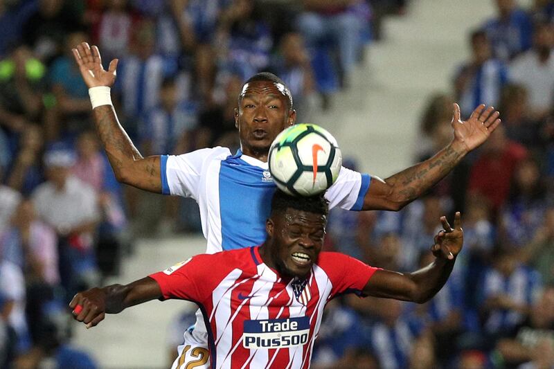 Atletico Madrid's Thomas in action with Leganes' Claudio Beauvue. Sergio Perez / Reuters
