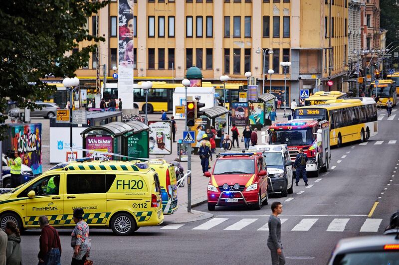 Ambulance cars gather at the site of a multiple stabbing in Turku, Finland.  Ari Matti Ruuska / EPA.