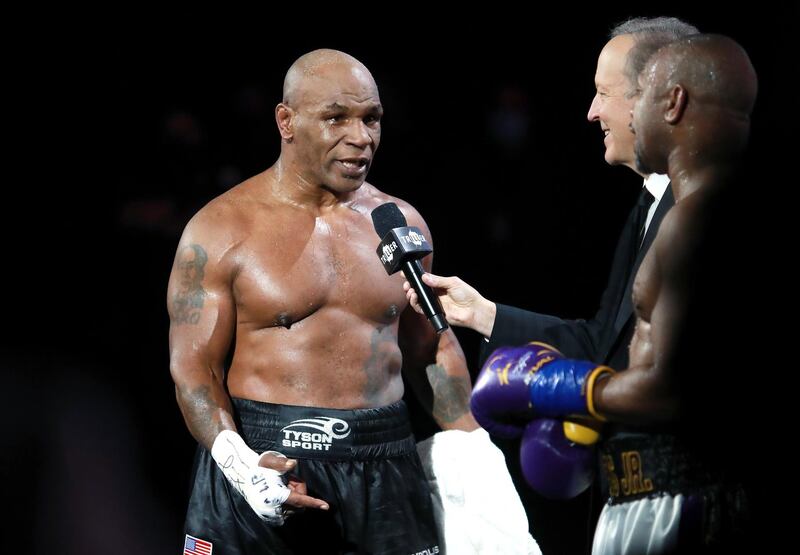 Mike Tyson is interviewed after his split draw against Roy Jones, Jr. Reuters
