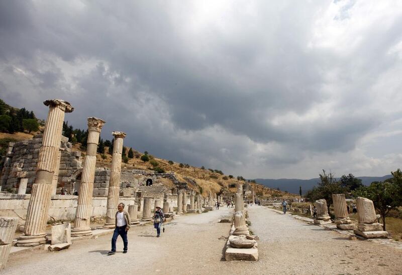People walk in the ancient Ephesus ruins near Turkey's western coastal city of Izmir.  Reuters/Osman Orsal