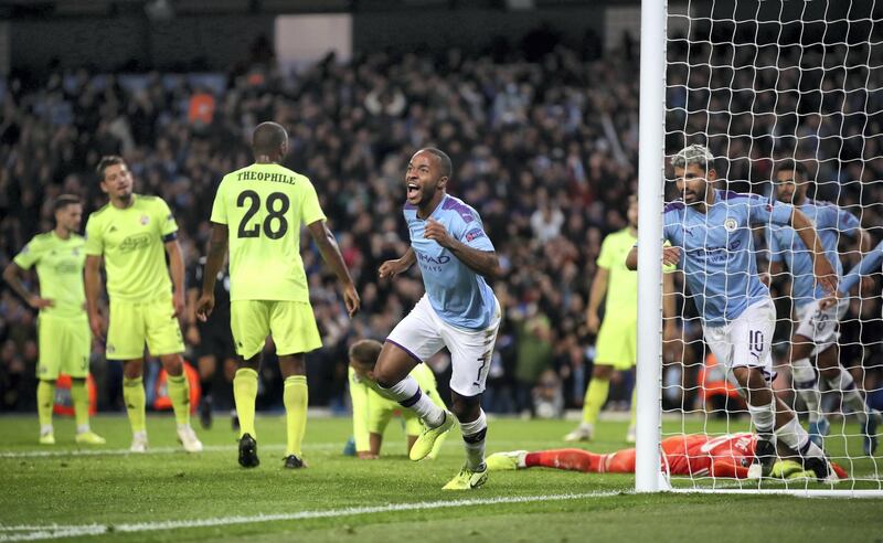 Manchester City's Raheem Sterling celebrates scoring his side's first goal of the game during the UEFA Champions League match at the Etihad Stadium, Manchester.