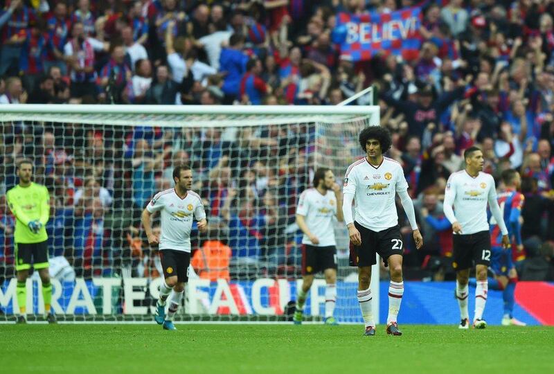 Marouane Fellaini of Manchester United (27) and team mates look dejected as Jason Puncheon of Crystal Palace scores their first goal during The Emirates FA Cup Final match between Manchester United and Crystal Palace at Wembley Stadium on May 21, 2016 in London, England. (Shaun Botterill/Getty Images)