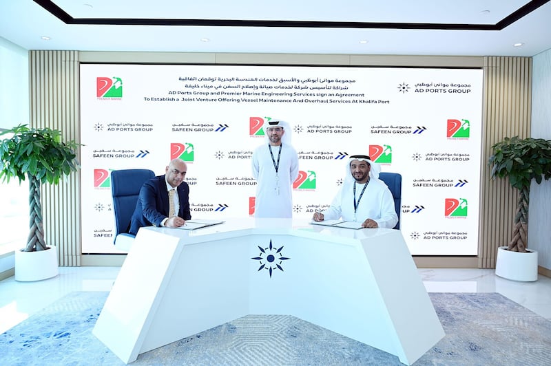 From left: Hemant Tandon, managing director of Premier Marine Engineering Services and Capt Ammar Al Shaiba, acting chief executive of the maritime cluster and Safeen Group at AD Ports Group, sign an agreement forming the Safeen Drydocks joint venture. Wam