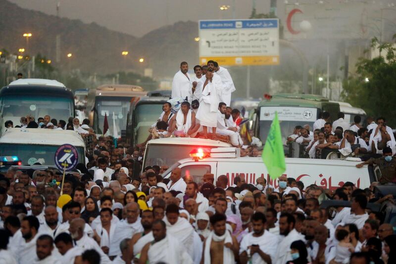 Muslim pilgrims pray as they prepare to leave Arafat on their way to Muzdalifah during the annual Hajj pilgrimage, near the holy city of Makkah, Saudi Arabia.  AP