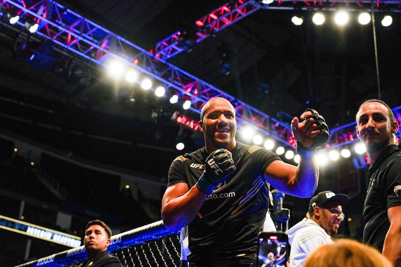 Ciryl Gane gestures to the crowd after defeating Derrick Lewis in the third round. AFP