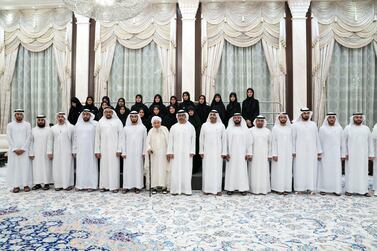 Sheikh Hamed bin Zayed, Chairman of the Crown Prince Court of Abu Dhabi and Abu Dhabi Executive Council Member (front row 8th L), stands for a group photograph with members of the General Authority for Islamic Affairs and Endowments., during an iftar reception at Al Bateen Palace. Seen with Sheikh Abdallah bin Bayyah (front row 7th L) and Dr Mohamed Matar Salem bin Abid Al Kaabi, chairman of the UAE General Authority of Islamic Affairs and Endowments (front row 9th L).  Ministry of Presidential Affairs