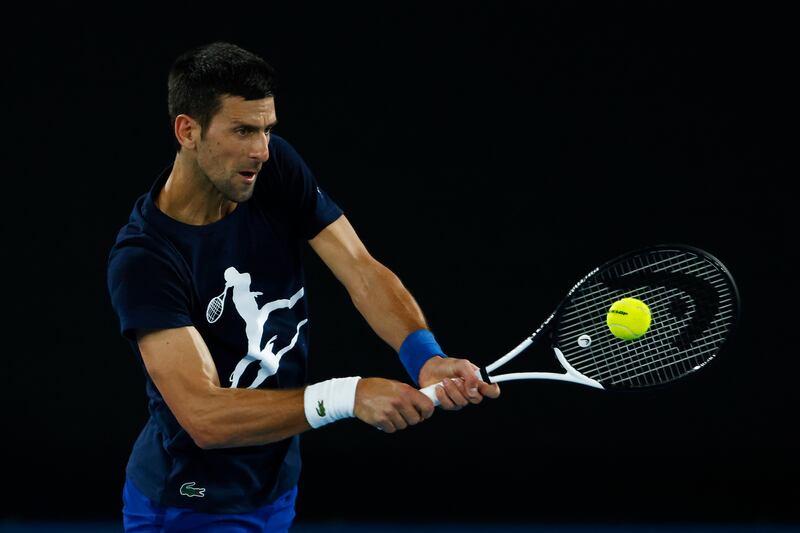 Novak Djokovic plays a backhand during a practice session ahead of the 2022 Australian Open at Melbourne Park. Getty Images