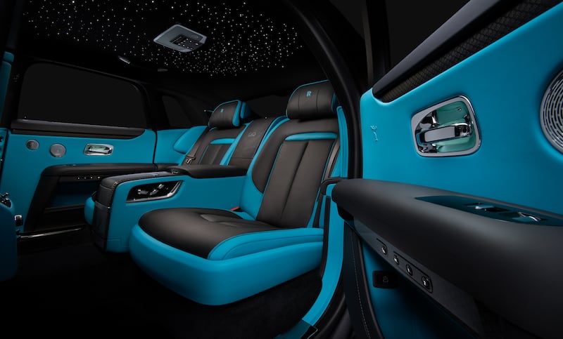 The black-and-blue interior of the car.