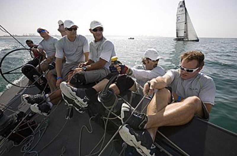 The Team Aqua crew in the hiking position to counteract the weight of the boat at the start of the first of two fleet races.