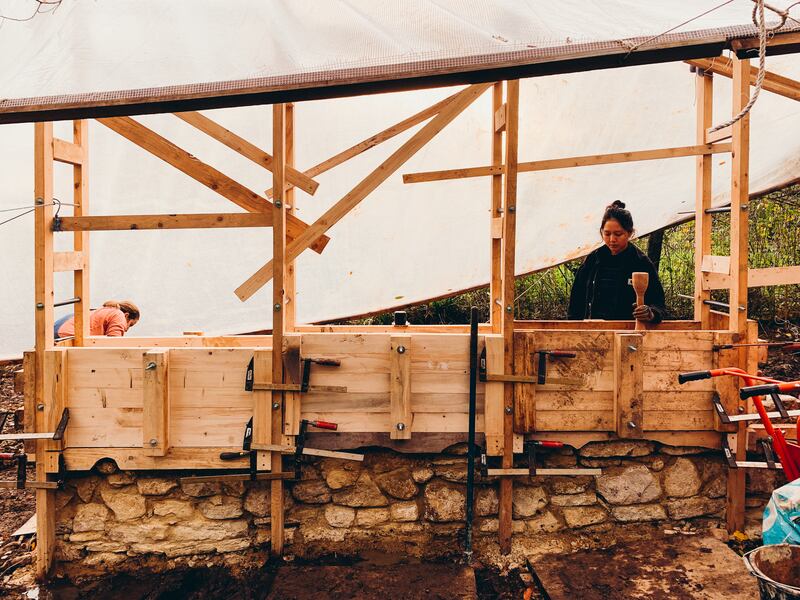Architects Amina Yusupova and Thanatcha Cholpradit working on Hooke Garden, winner of The Rammed Earth Pavilion competition. All photos: Buildner