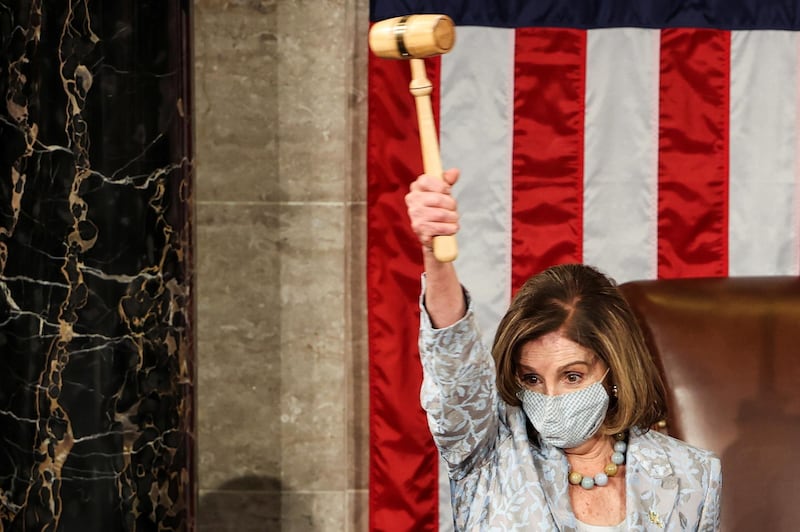 Speaker of the House Nancy Pelosi (D-CA) waves a gavel during the first session of the 117th Congress in the House Chamber at the U.S. Capitol in Washington, DC, U.S., January 3, 2021. Tasos Katopodis/Pool via REUTERS?