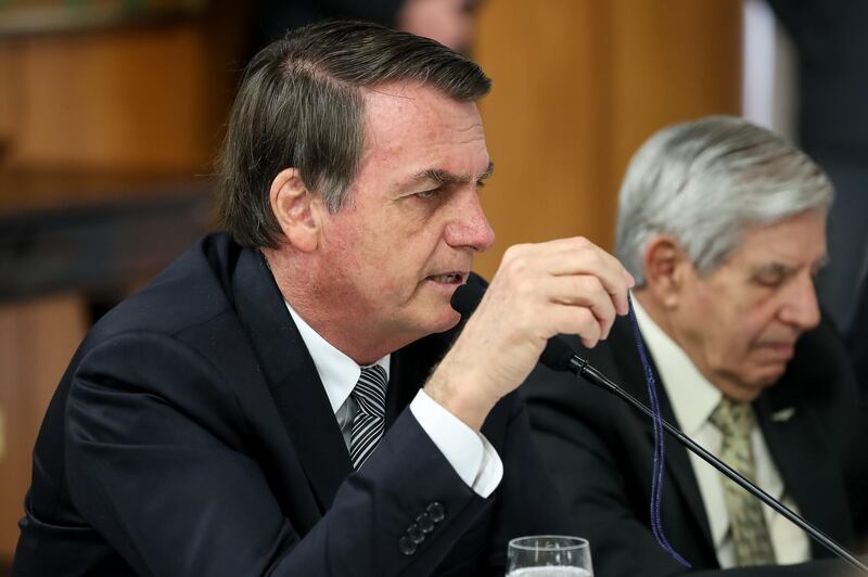 Handout picture released by the Brazilian Presidency press office showing Brazilian President Jair Bolsonaro during an interview with foreign correspondents at Planalto Palace in Brasilia on July 19, 2019. RESTRICTED TO EDITORIAL USE - MANDATORY CREDIT 'AFP PHOTO /  BRAZILIAN PRESIDENCY - MARCOS CORREA' - NO MARKETING - NO ADVERTISING CAMPAIGNS - DISTRIBUTED AS A SERVICE TO CLIENTS


 / AFP / BRAZILIAN PRESIDENCY / Marcos Correa / RESTRICTED TO EDITORIAL USE - MANDATORY CREDIT 'AFP PHOTO /  BRAZILIAN PRESIDENCY - MARCOS CORREA' - NO MARKETING - NO ADVERTISING CAMPAIGNS - DISTRIBUTED AS A SERVICE TO CLIENTS


