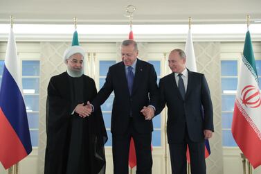 The last time Recep Tayyip Erdogan, centre, Vladimir Putin, right, and Hassan Rouhani met to renew the Astana Process was in September 2019 in Istanbul. EPA