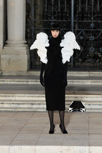 Models wore shrouds and head scarves, in a nod to Sicilian widows. Photo: Dolce & Gabbana