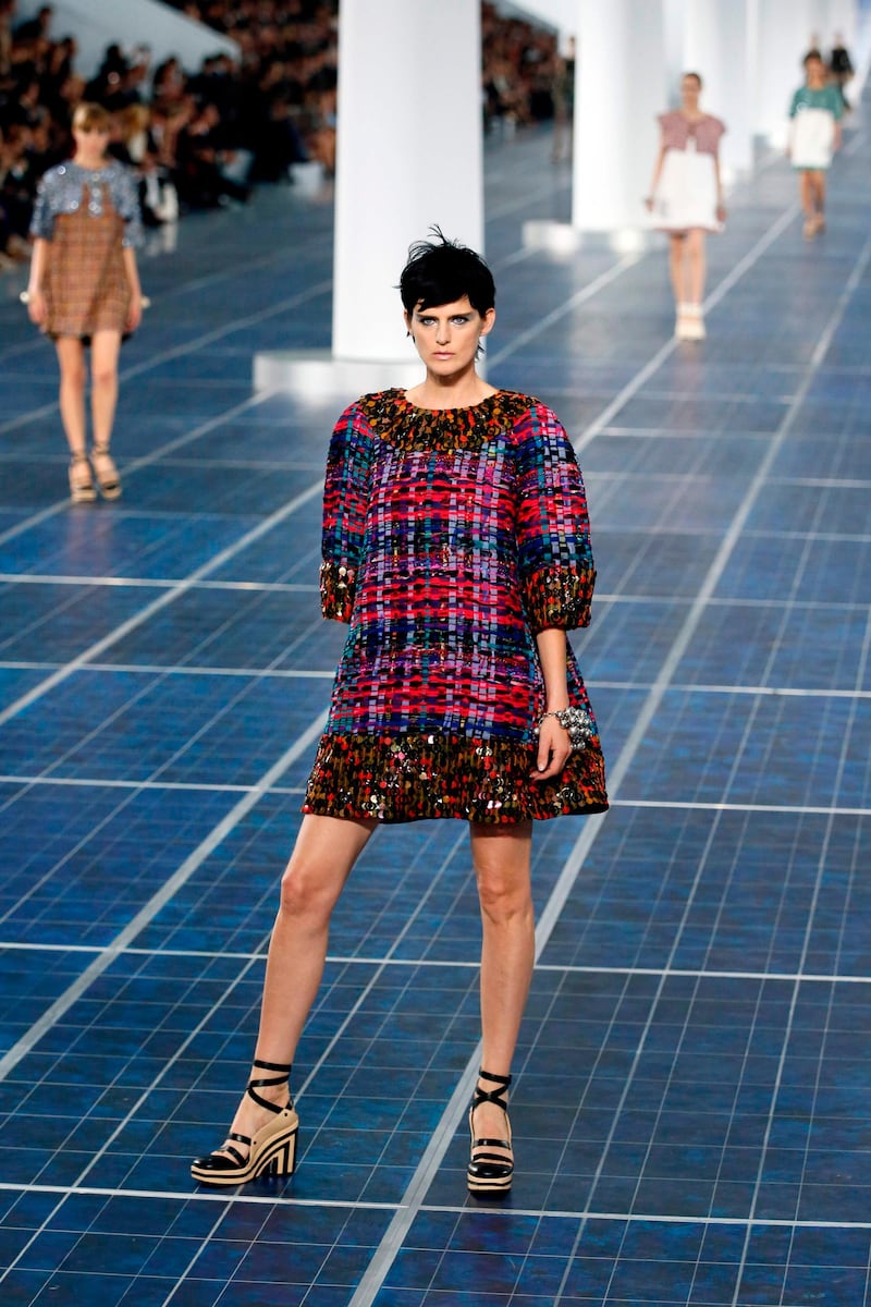 Stella Tennant presents a creation for Chanel for the spring/summer 2013 ready-to-wear collection in Paris. AFP