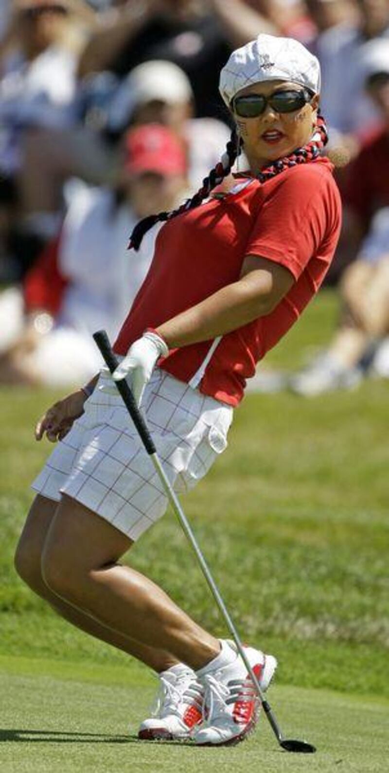Christina Kim, all flying pigtails and earrings, was the player who worked the crowd better than anyone during the Solheim Cup.