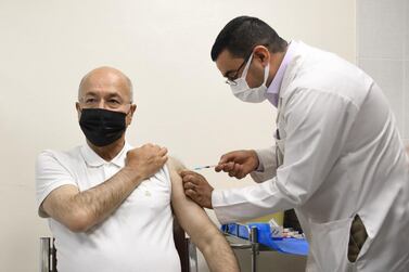 Iraq's President Barham Salih is vaccinated against Covid-19 in Baghdad on Monday. Courtesy: Presidency of the Republic of Iraq Office