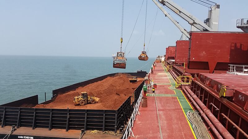 Above, EGA's first bauxite bulk sample from its new 12-million-tonne per year bauxite mine in Guinea are loaded in Port of Kamsar. Courtesy Emirates Global Aluminium