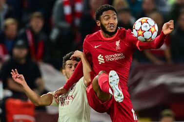 AC Milan's Spain's midfielder Brahim Diaz (L) vies with Liverpool's English defender Joe Gomez during the UEFA Champions League 1st round Group B football match between Liverpool and AC Milan at Anfield in Liverpool, north west England on September 15, 2021.  (Photo by Paul ELLIS  /  AFP)