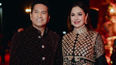 This photograph released by the Reliance group shows Indian cricketer Sachin Tendulkar posing for a photograph with his wife Anjali at a pre-wedding bash of billionaire industrialist Mukesh Ambani's son Anant Ambani in Jamnagar, India, Saturday, Mar.  02, 2024.  (Reliance group via AP)