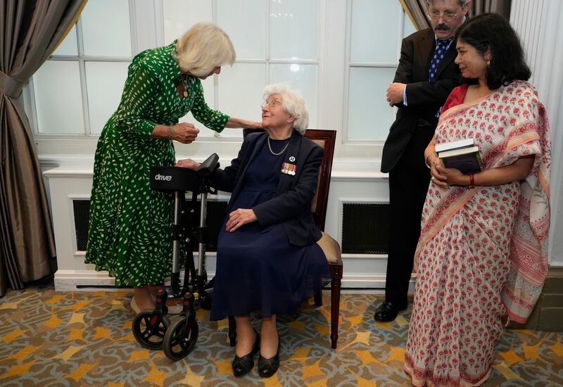 Queen Camilla meets meets Mildred Schutz, 99, a former Special Operations Executive. PA