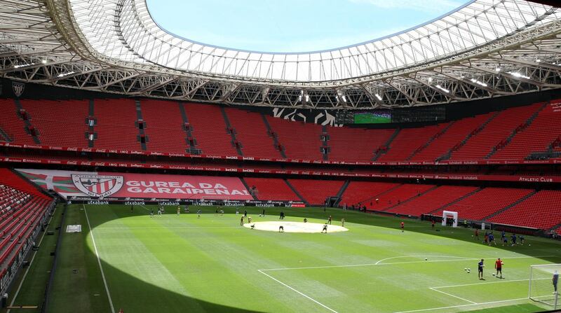 Players warm up before the match at San Mames Stadium. EPA