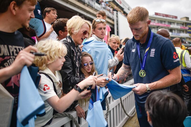 Ben Stokes signs autographs during the England ICC World Cup Victory Celebration at The Kia Oval in London, England. Getty Images
