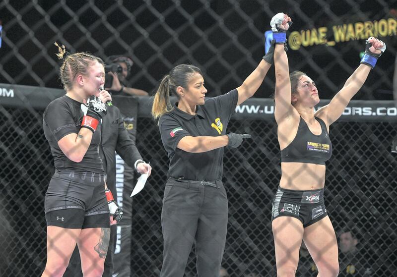 Abu Dhabi, United Arab Emirates - Corinne Laframboise from Canada, wins against Cornelia Holm for the UAE Warriors Fighting Championship in the Mubadala Arena, Zayed Sports City. Khushnum Bhandari for The National