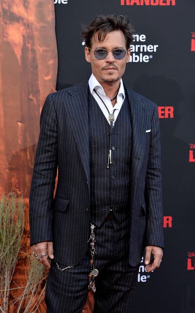 ANAHEIM, CA - JUNE 22:  Actor Johnny Depp arrives at the premiere of Walt Disney Pictures' 'The Lone Ranger' at Disney California Adventure Park on June 22, 2013 in Anaheim, California.  (Photo by Frazer Harrison/Getty Images)