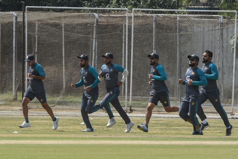 Pakistan's players warm up before their practice session in Lahore. AFP