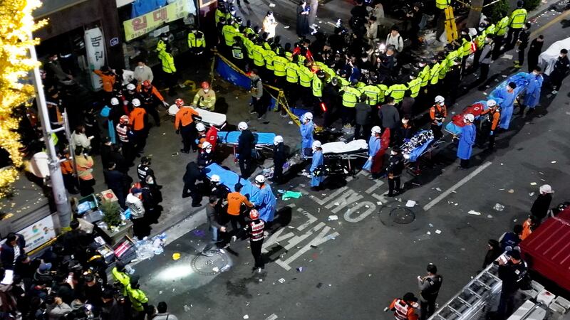 Rescue teams at work in Itaewon district. Reuters