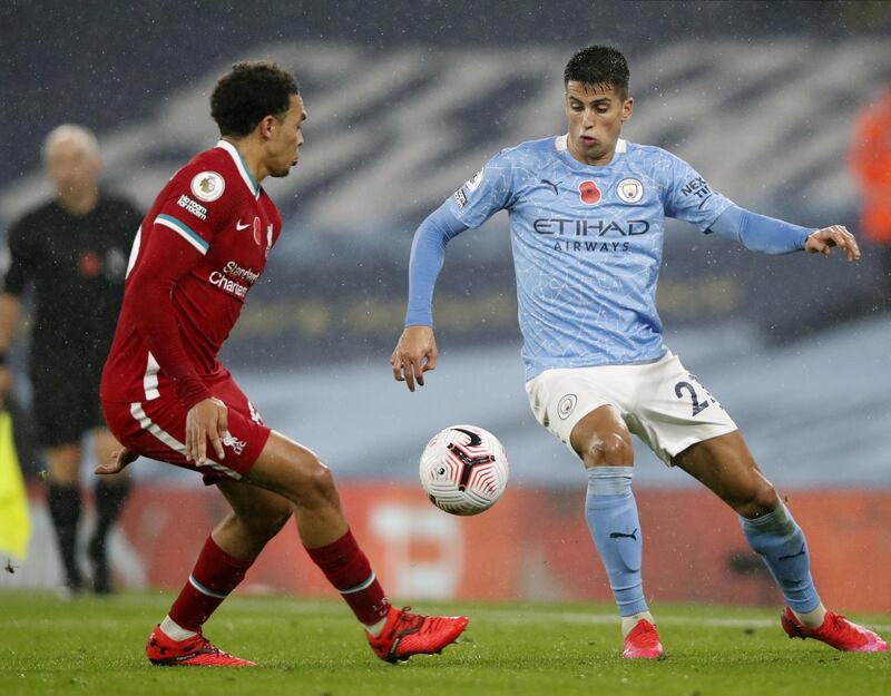 Joao Cancelo - 7. Uncertain start as Liverpool targeted the Portuguese’s flank but he held his own. Provided lovely cross for Jesus that the striker headed wide. EPA