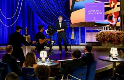 Joaquin Phoenix presents the Oscar for Actor in a Leading Role during the live ABC Telecast of The 93rd Oscars in Los Angeles, California, U.S., April 25, 2021. Todd Wawrychuk/A.M.P.A.S./Handout via REUTERS ATTENTION EDITORS. THIS IMAGE HAS BEEN SUPPLIED BY A THIRD PARTY. NO MARKETING OR ADVERTISING IS PERMITTED WITHOUT THE PRIOR CONSENT OF A.M.P.A.S AND MUST BE DISTRIBUTED AS SUCH. MANDATORY CREDIT. NO RESALES. NO ARCHIVES     TPX IMAGES OF THE DAY