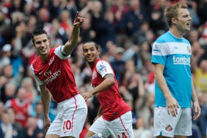 Robin van Persie, left, scored twice to help Arsenal to a 2-1 win against Sunderland.