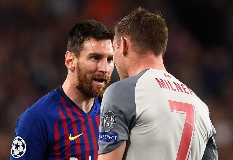 Messi argues with Milner after their clash. AFP