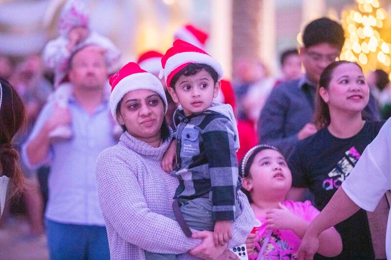 People come to watch the lighting of the Christmas tree at Al Wasl dome