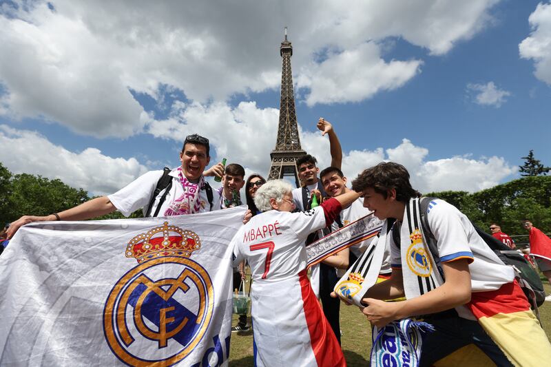  Fans gather in Paris for Liverpool v Real Madrid. Reuters