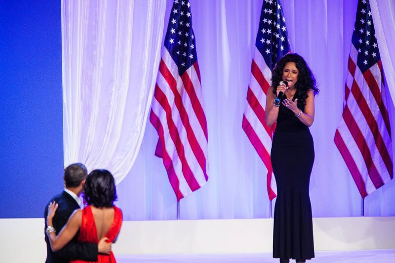 epa03549171 US singer Jennifer Hudson finishes singing for the President Barack Obama and First Lady Michelle Obama as they dance at the Inaugural Ball at the Walter E. Washington Convention Center in Washington, DC,  USA, 21 January 2013. Obama was ceremonially sworn in for a second term as the 44th President of the United States in Washington, D.C. Obama defeated Republican candidate Mitt Romney on Election Day 06 November 2012 to be re-elected for a second term.  EPA/PETE MAROVICH *** Local Caption ***  03549171.jpg