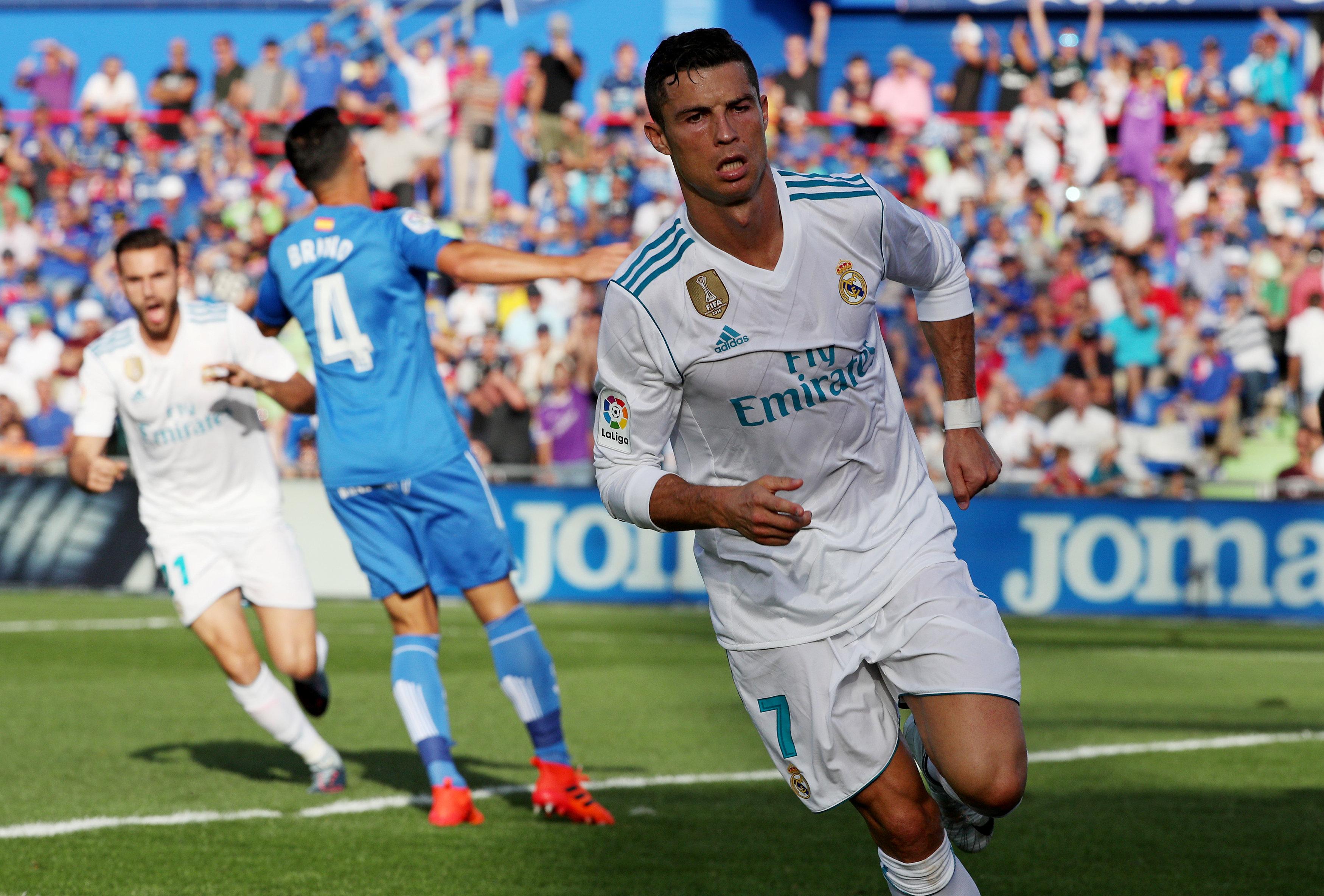 Soccer Football - La Liga Santander - Getafe vs Real Madrid - Coliseum Alfonso Perez, Getafe, Spain - October 14, 2017   Real Madrid’s Cristiano Ronaldo celebrates scoring their second goal       REUTERS/Sergio Perez