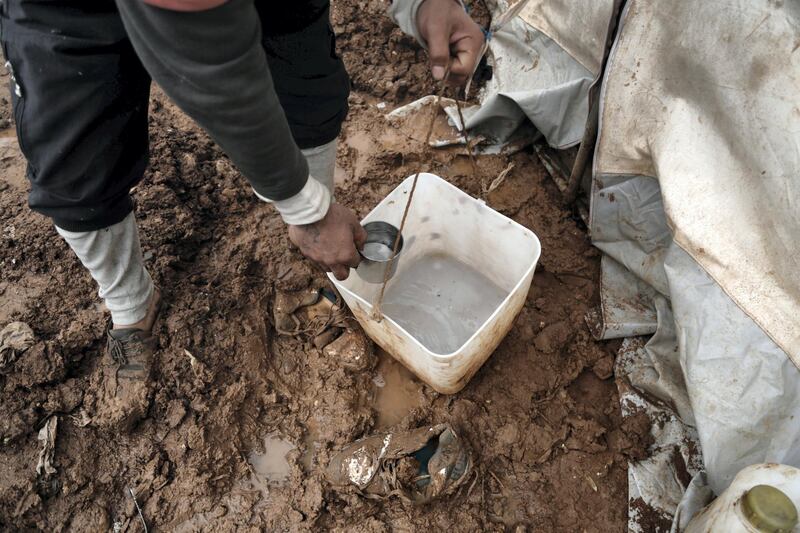 Location: Al-Karama camp in Atama. The aftermath of heavy rainfall on north Syria, residents lost their furniture, clothes and bedding as well as the tents waiting outside in open lands until the civil defense and NGs arrive to rescue them.