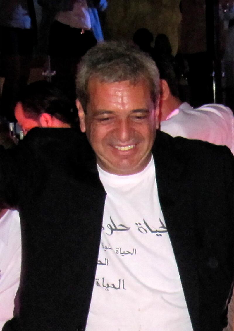 The late Hatem Nusseibeh wearing a t-shirt with his favourite French saying 'la vie est belle', life is beautiful, in Arabic. Courtesy Lina Sinjab