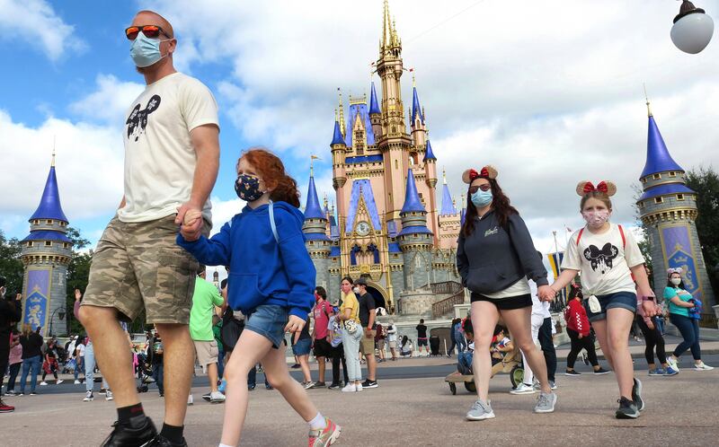 Masks will still be required for visitors aged 2 and over at all of the park’s indoor locations and attractions. AP