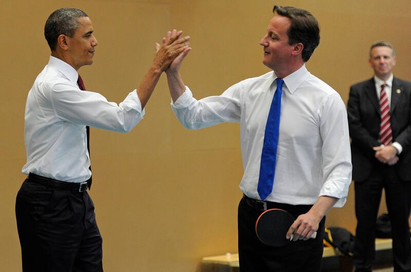 Barack Obama and Mr Cameron play table tennis at the Globe Academy in south London during the US President's state visit to Britain in May 2011